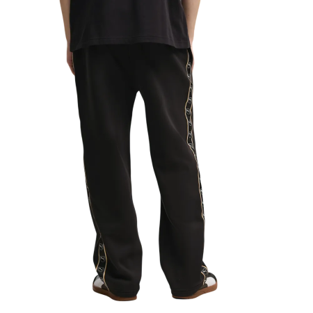 Pantalón Puma ESS ELEVATED TAPE Relaxed FL op "Black"