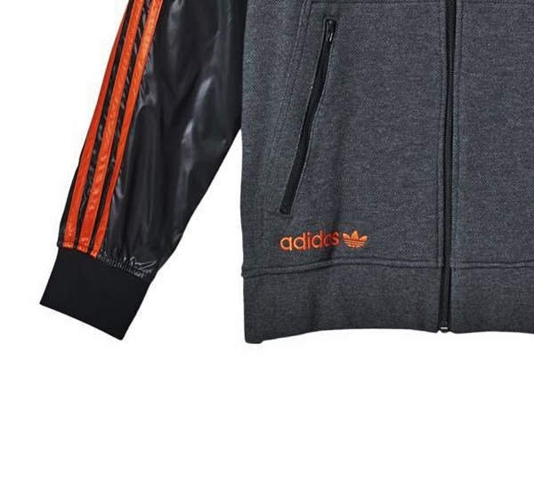 Chandal adidas hombre negro y naranja hotsell